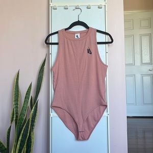 NWOT. Nike bodysuit.